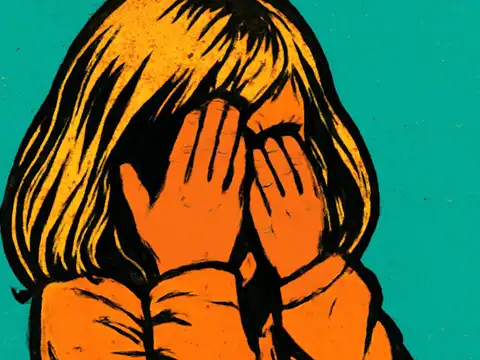 A child with a fringe covering their face with both hands, rendered as a flat orange and teal illustration.